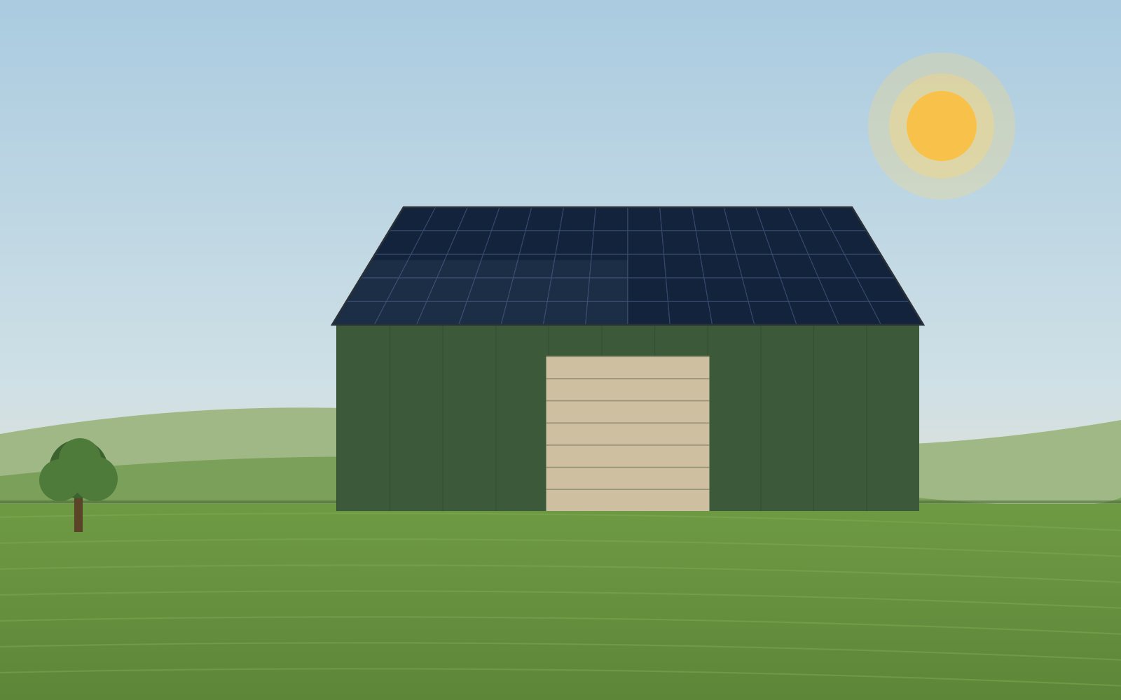 Solar panels covering the roof of a steel-frame agricultural barn in a green field